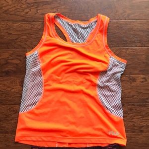 Fila running shirt doesn’t have size tag fit is M